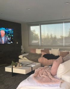 Spacious living room in Chula Vista featuring high quality pull down window shades fully closed, offering privacy and a sleek look.